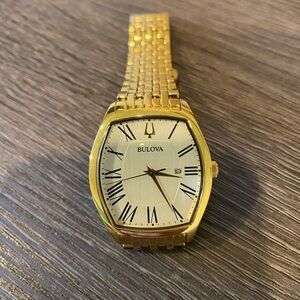 Bulova gold women’s watch